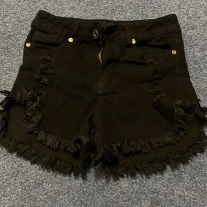 Black distressed shorts